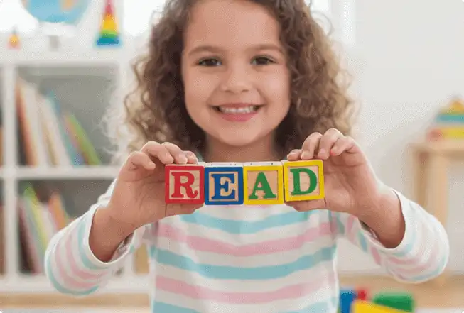 Child learning with colorful letters